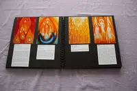 Book with photos of the paintings
